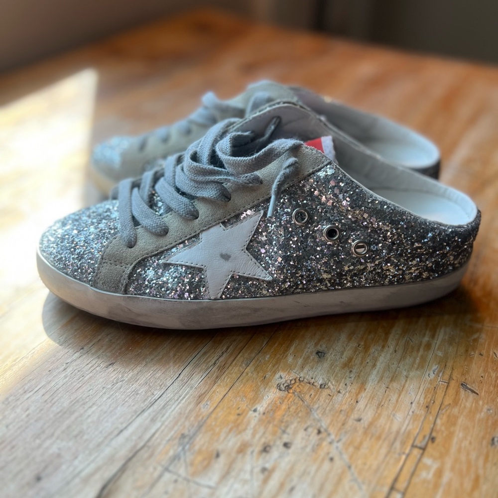 Golden Goose Gray Silver Glitter tennis shoe slide.